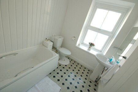 Spacious bathroom with accommodation